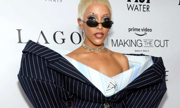 Doja Cat speaking during a press interview, representing her funniest and most candid interview moments