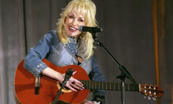 Dolly Parton smiling during a televised interview, representing her most memorable interview moments