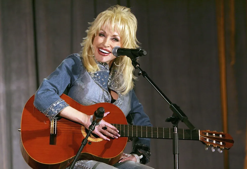 Dolly Parton smiling during a televised interview, representing her most memorable interview moments