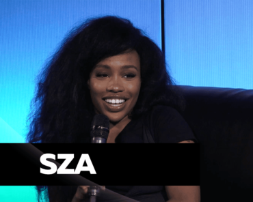 SZA speaking during a press interview, representing her honest remarks on creativity and self-doubt