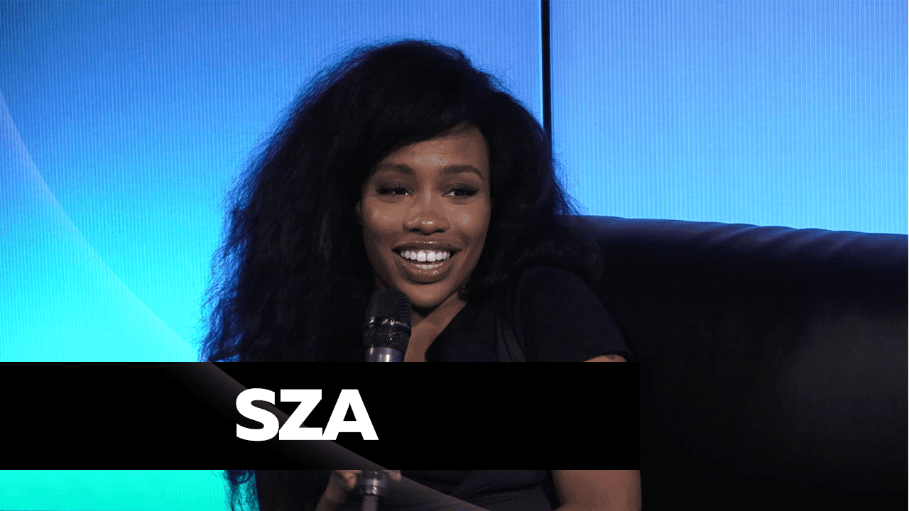 SZA speaking during a press interview, representing her honest remarks on creativity and self-doubt