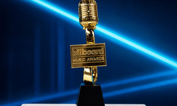 A Billboard chart displayed on screen, representing the data-driven process behind the Billboard Music Awards