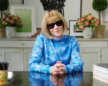 Anna Wintour attending a major fashion event, representing her far-reaching influence on music, fashion, and culture