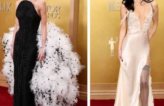 A fashion editor reviewing red carpet photos from award season, representing how best-dressed lists are compiled after major events