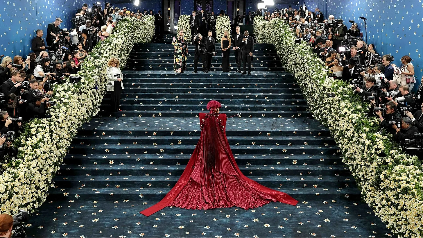 The exterior of the Metropolitan Museum of Art during the Met Gala, representing the event's broader cultural significance