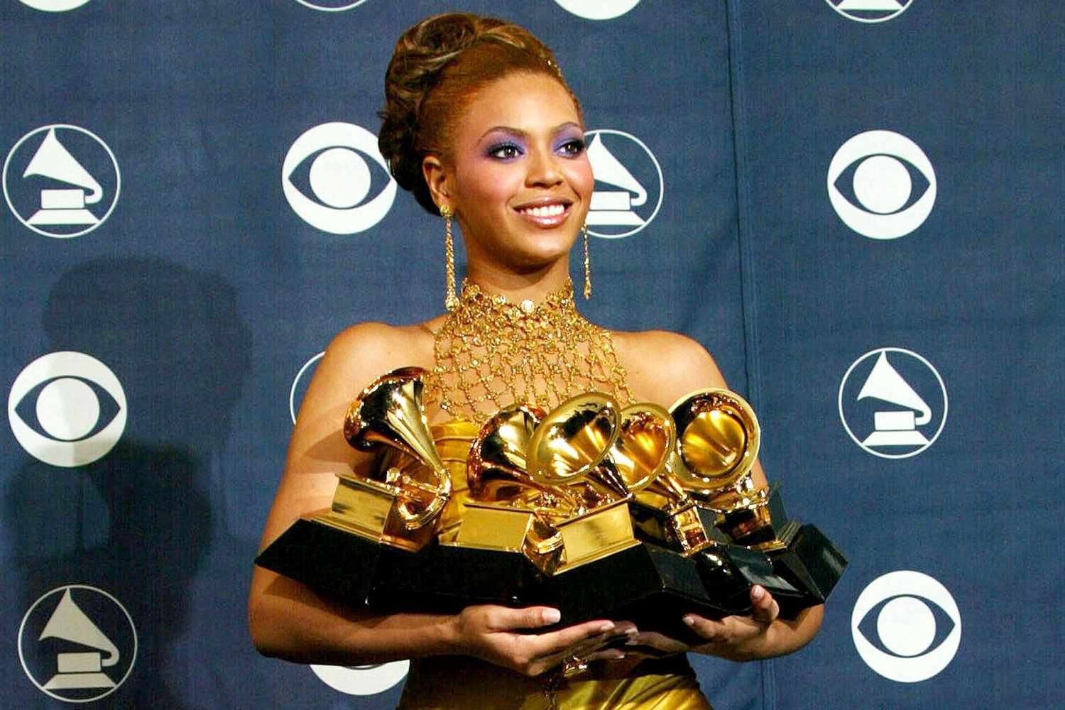 A row of Grammy Award trophies, representing the artists who have won the most awards in the ceremony's history