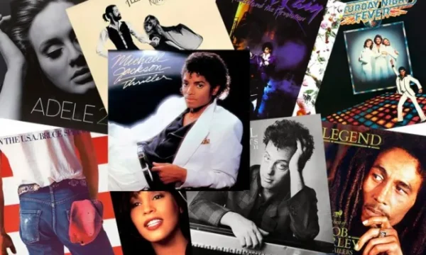 A collection of vinyl records displaying iconic album cover art, representing music history's most memorable visual designs