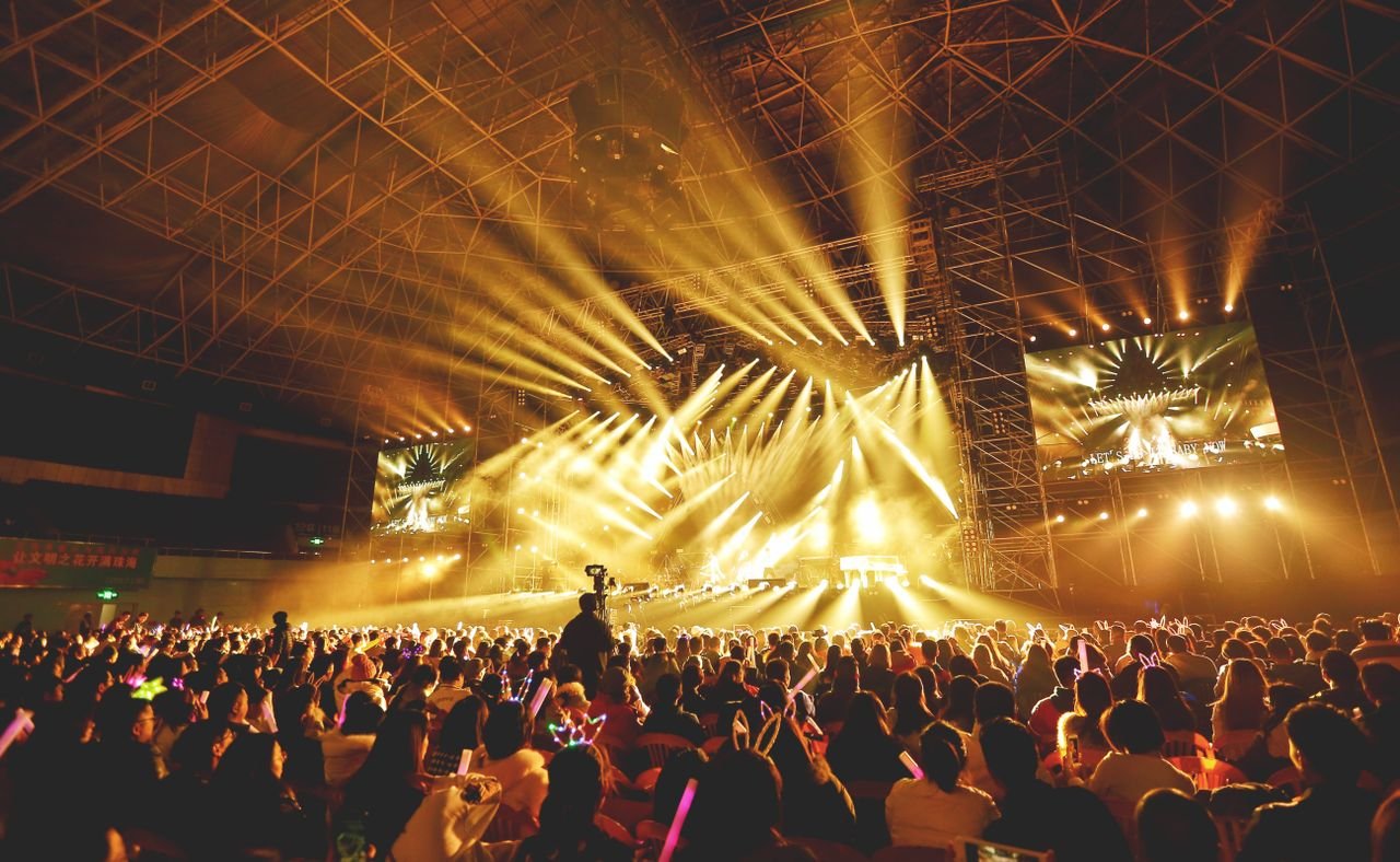 A packed stadium during a major concert tour, representing how touring has come to outweigh album sales for many artists