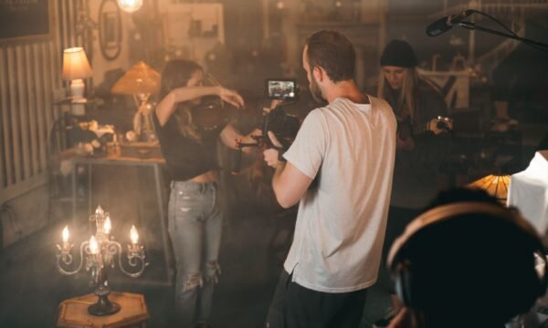 A film scene paired with a licensed song cue, representing how sync licensing revives older music for new audiences