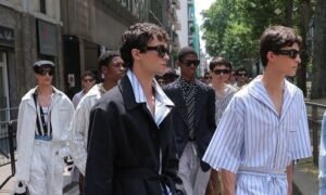A minimalist, logo-free luxury outfit, representing the "quiet luxury" aesthetic and its rise in celebrity style