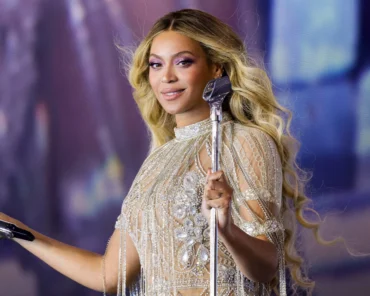 Beyoncé performing on stage, representing a decade-by-decade breakdown of her musical eras