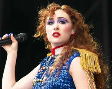 Chappell Roan performing live on stage, representing her breakout year in pop music