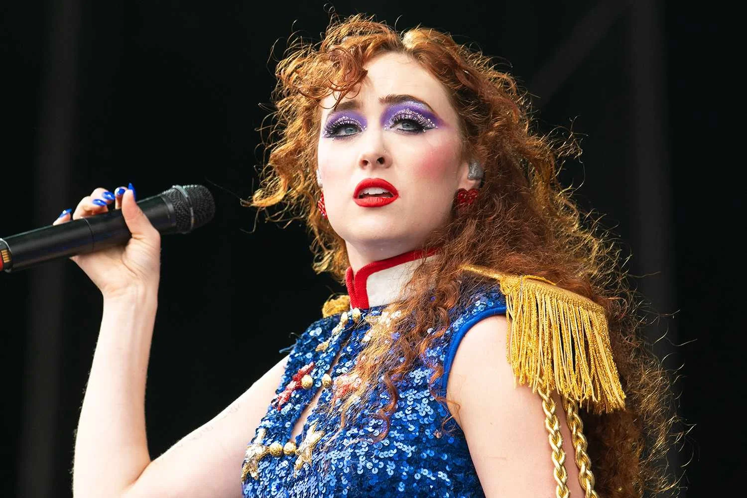 Chappell Roan performing live on stage, representing her breakout year in pop music
