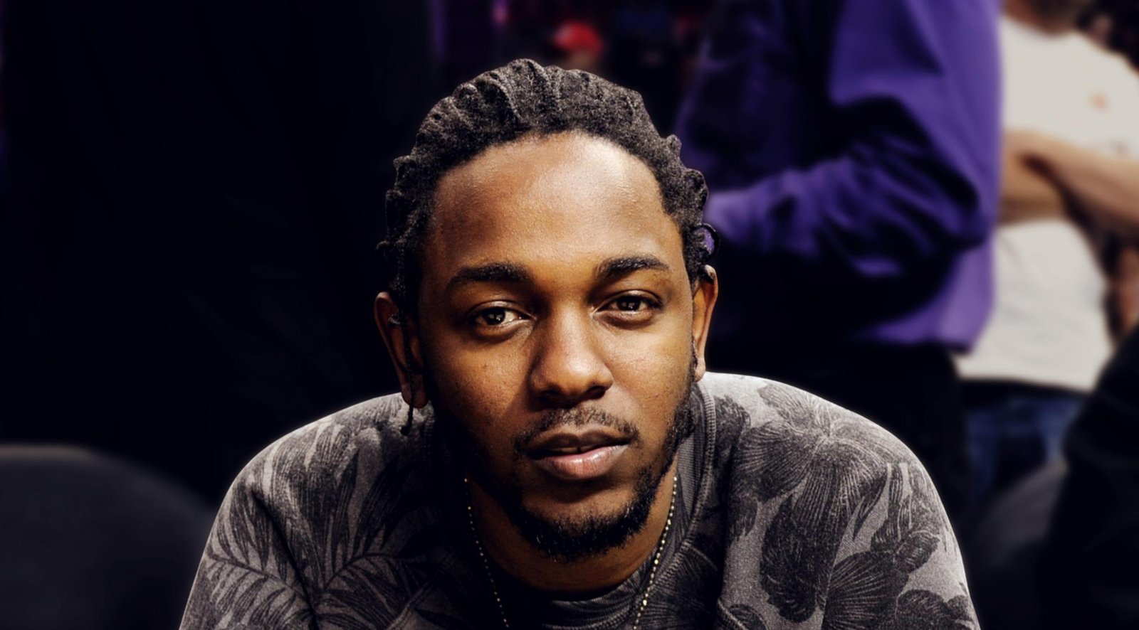 Kendrick Lamar performing on stage, representing his career timeline and cultural impact