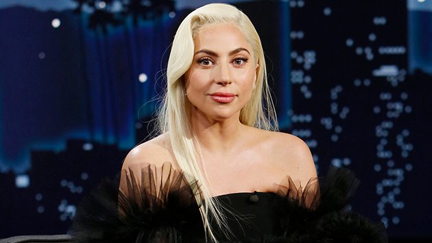 Lady Gaga performing on stage, representing the many reinventions across her career