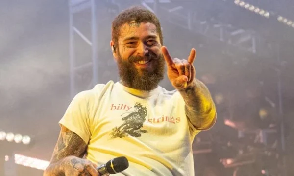 Post Malone performing on stage, representing his path from SoundCloud artist to mainstream stardom