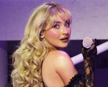 Sabrina Carpenter performing on stage, representing her breakout rise in pop music