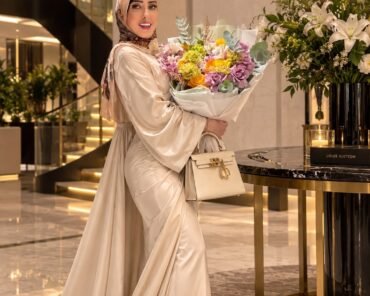 May Ahmed, founder of H&T Boutique, with one of her luxury handbag designs